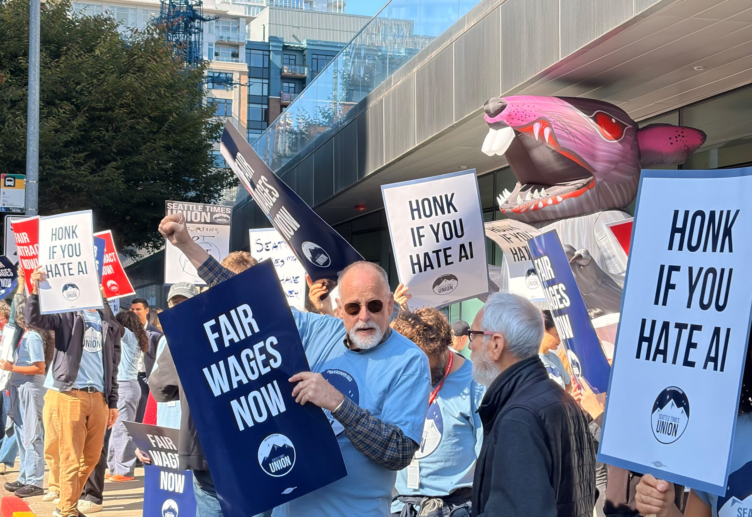 https://www.thestranger.com/news/seattle-times-journalists-picket-newsroom-over-low-pay-and-threats-of-being-replaced-by-ai/ social preview image